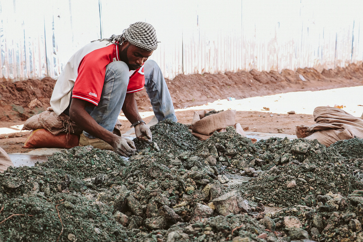 Young Man working on a cobald mining site