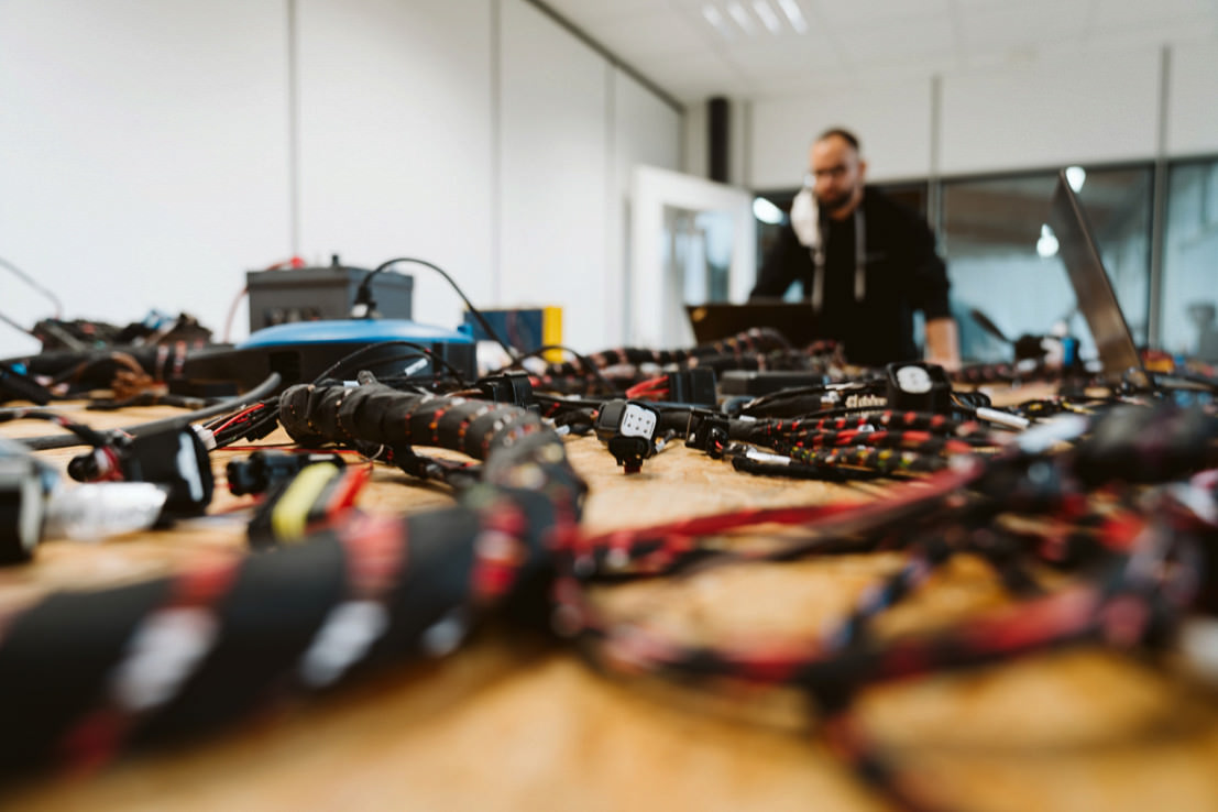 The wire harness from one of the prototypes on the test bench